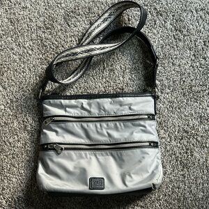 the Sak light grey purse with long strap